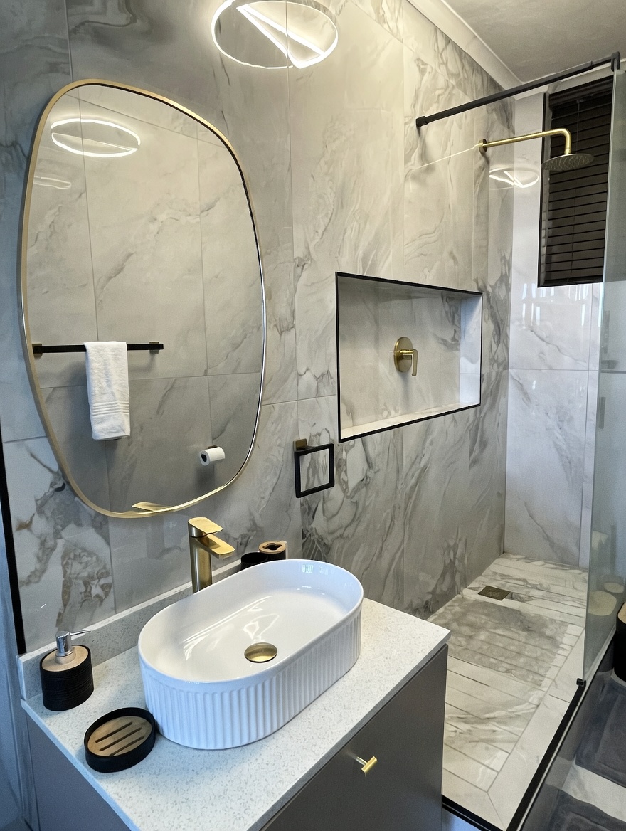 Bathroom one — basin & shower